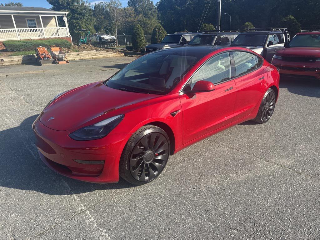 used 2022 Tesla Model 3 car, priced at $28,750