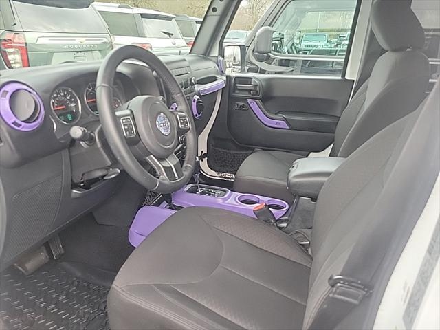 used 2016 Jeep Wrangler Unlimited car, priced at $17,580