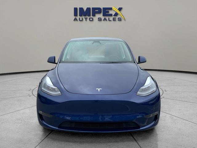 used 2023 Tesla Model Y car, priced at $34,975