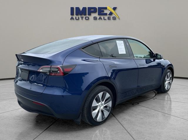 used 2023 Tesla Model Y car, priced at $34,975