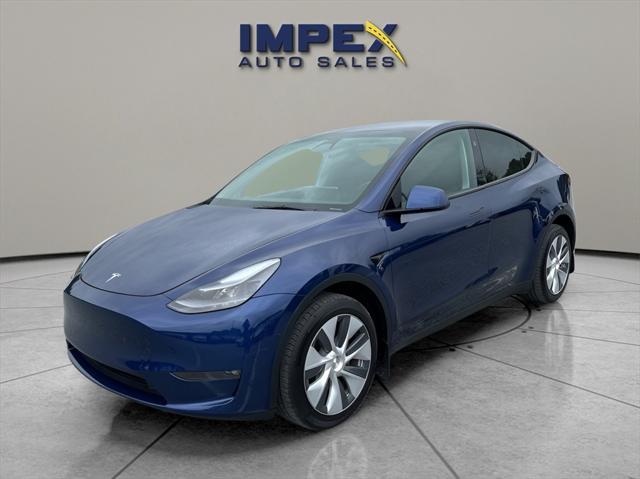 used 2023 Tesla Model Y car, priced at $34,975