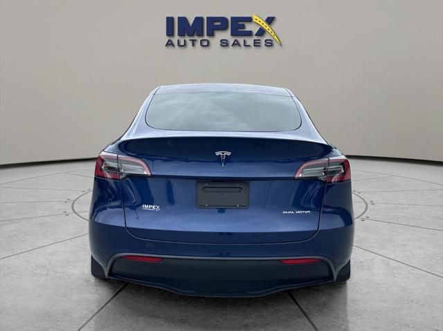 used 2023 Tesla Model Y car, priced at $34,975