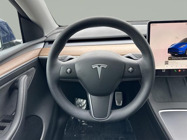 used 2023 Tesla Model Y car, priced at $34,975