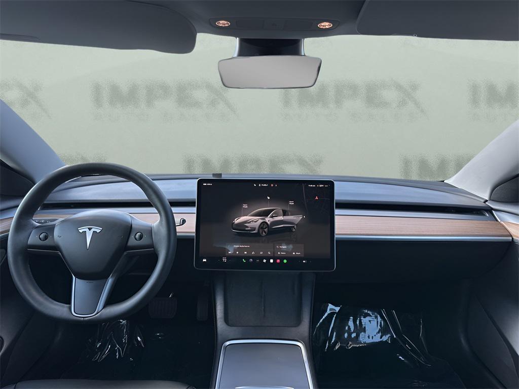 used 2023 Tesla Model 3 car, priced at $24,250