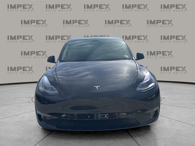 used 2024 Tesla Model Y car, priced at $35,500