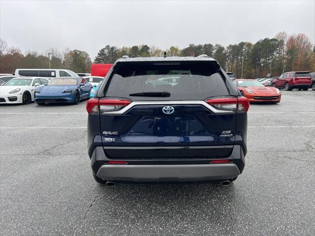 used 2021 Toyota RAV4 Hybrid car, priced at $31,880