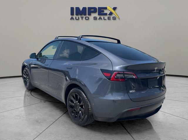 used 2021 Tesla Model Y car, priced at $28,995