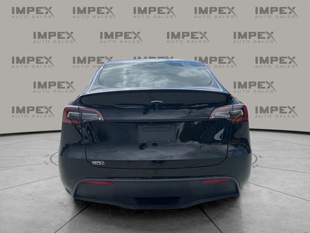 used 2022 Tesla Model Y car, priced at $30,780