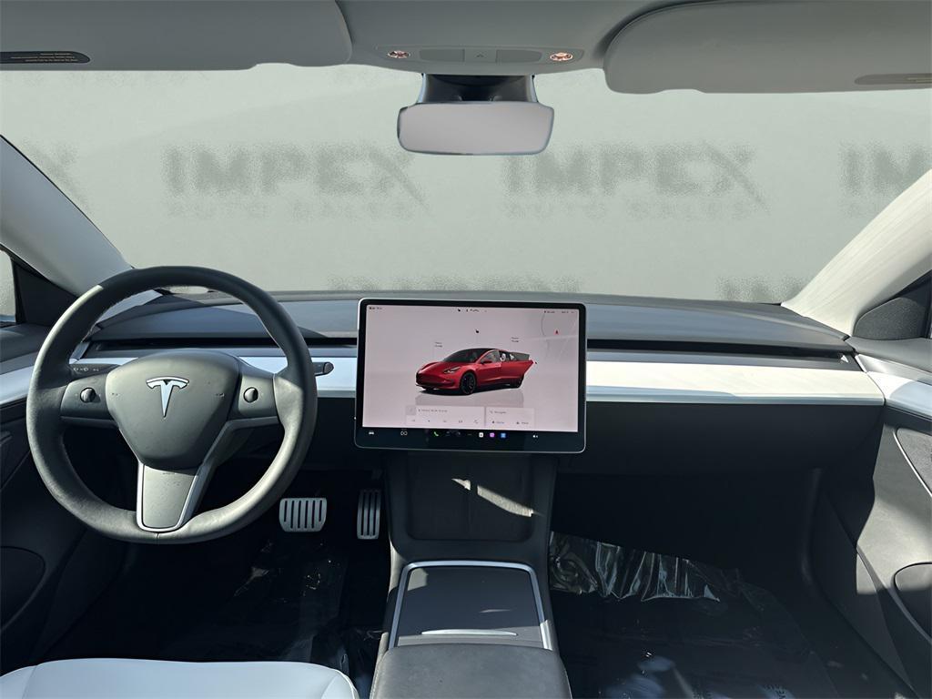used 2023 Tesla Model 3 car, priced at $32,210