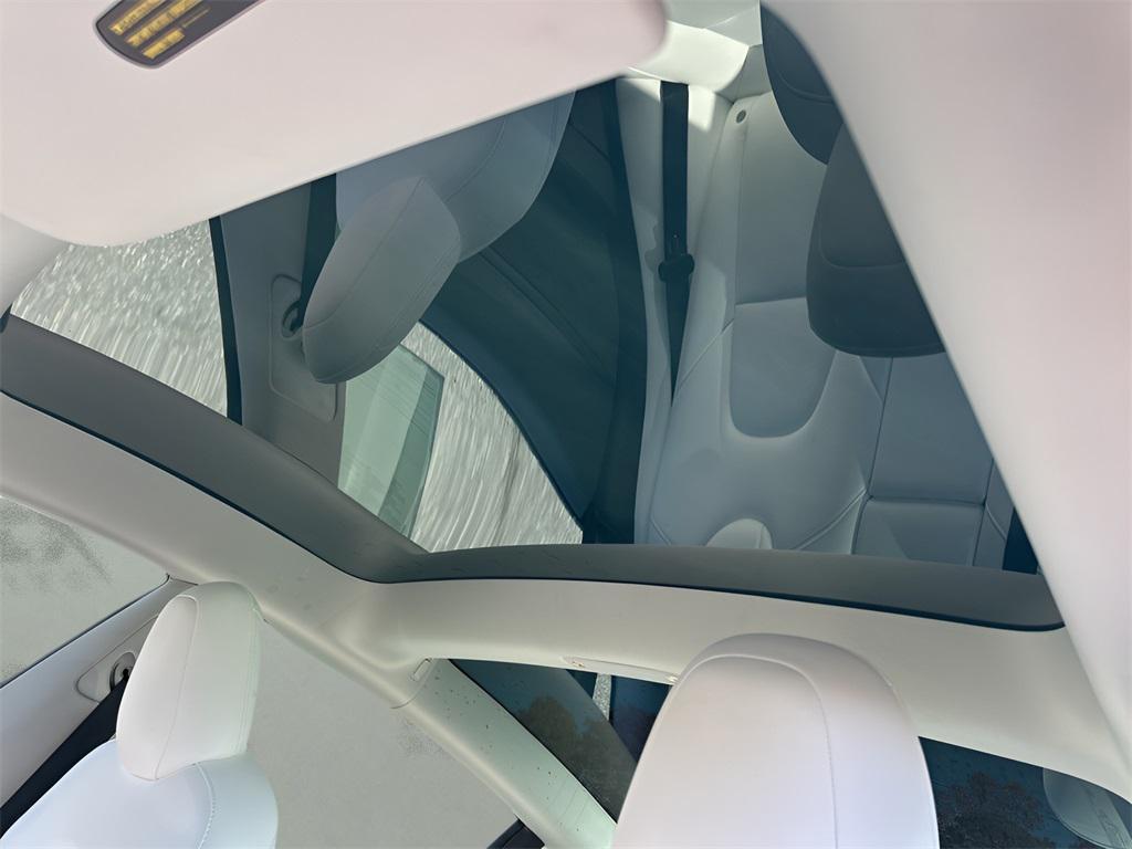 used 2023 Tesla Model 3 car, priced at $32,210