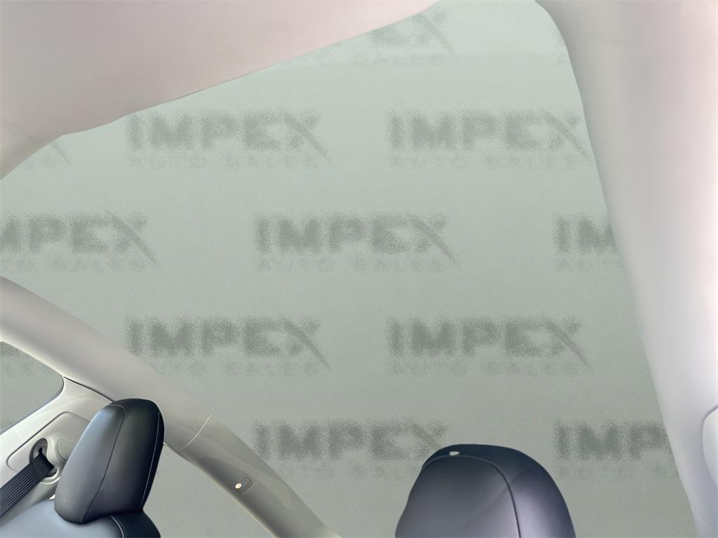 used 2023 Tesla Model Y car, priced at $34,650