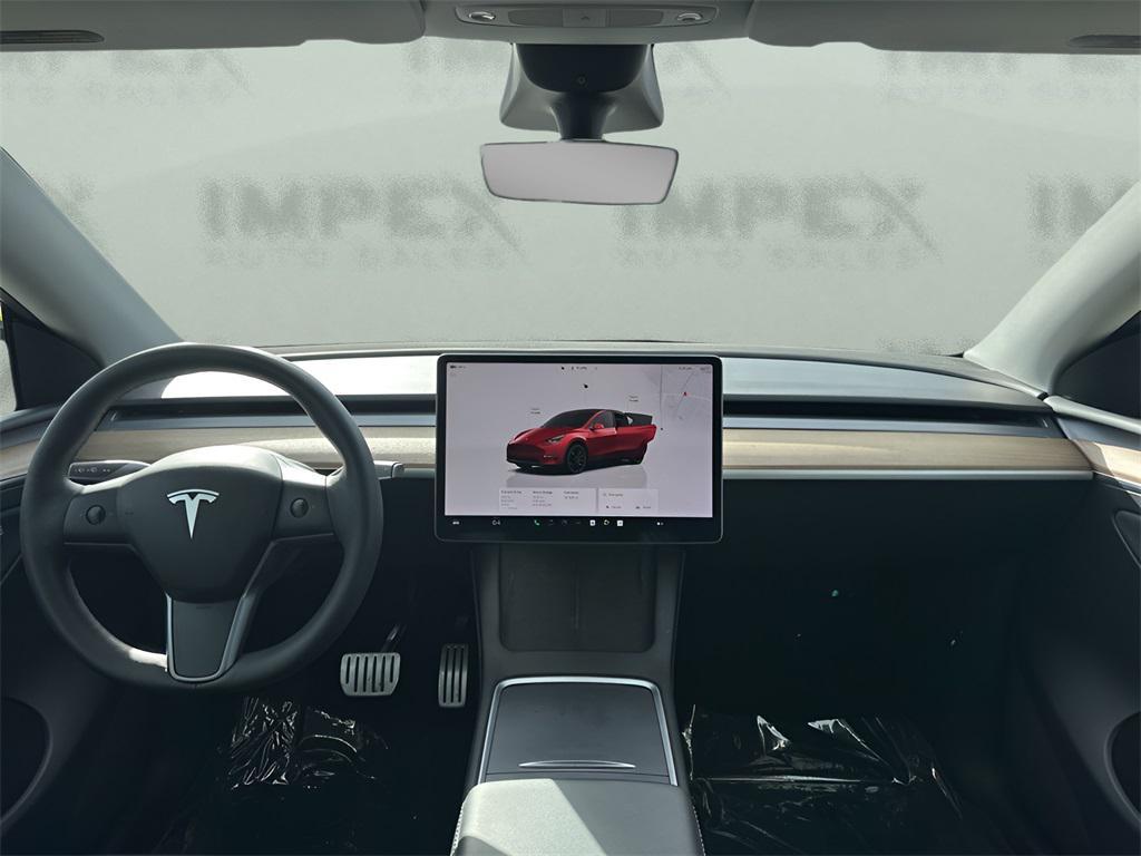 used 2023 Tesla Model Y car, priced at $34,650