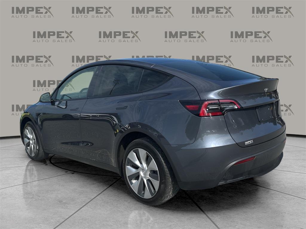 used 2023 Tesla Model Y car, priced at $30,500