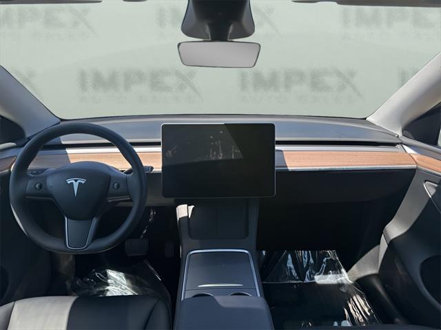 used 2024 Tesla Model Y car, priced at $35,250
