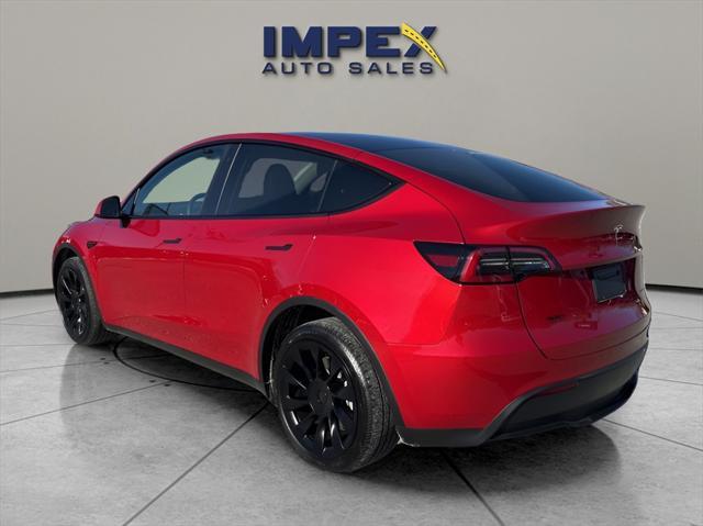 used 2023 Tesla Model Y car, priced at $34,260