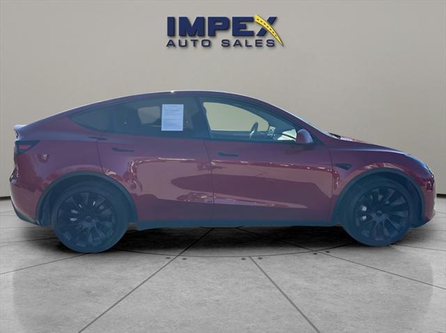 used 2023 Tesla Model Y car, priced at $34,260