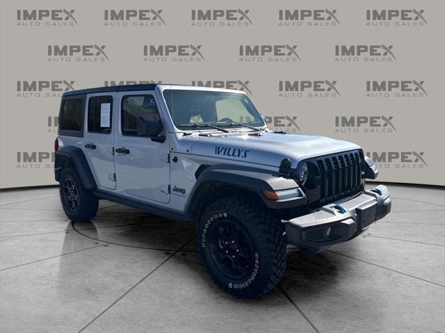 used 2023 Jeep Wrangler 4xe car, priced at $29,860