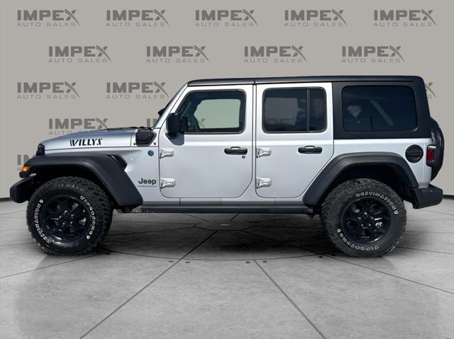 used 2023 Jeep Wrangler 4xe car, priced at $29,860