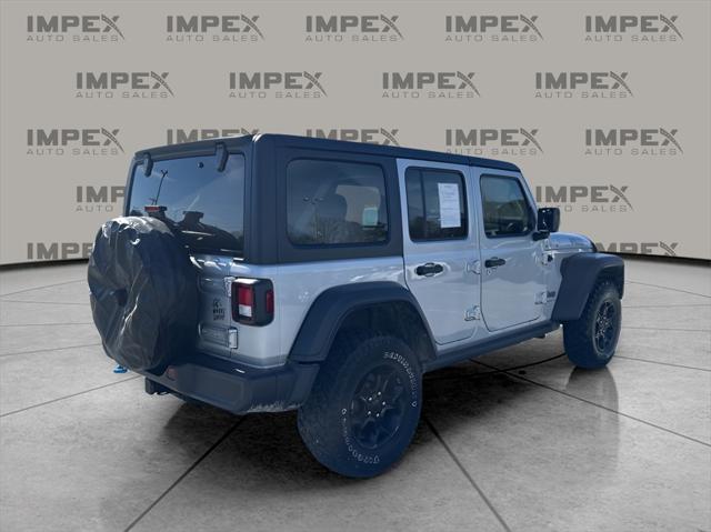 used 2023 Jeep Wrangler 4xe car, priced at $29,860