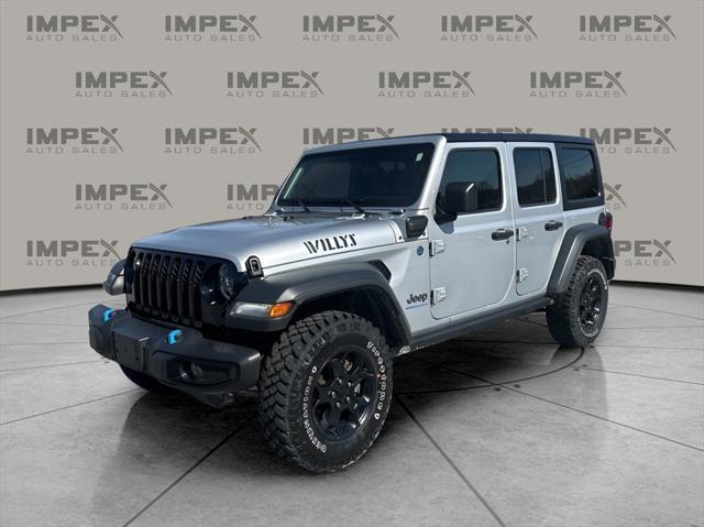 used 2023 Jeep Wrangler 4xe car, priced at $29,860