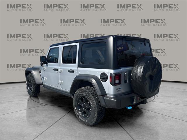 used 2023 Jeep Wrangler 4xe car, priced at $29,860