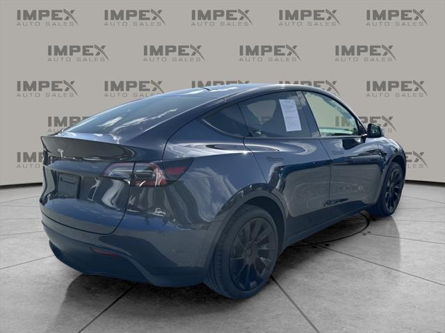 used 2025 Tesla Model Y car, priced at $40,450
