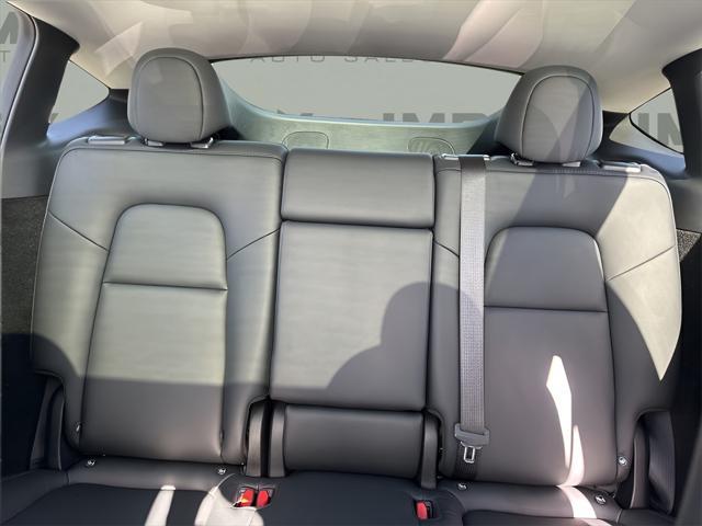 used 2025 Tesla Model Y car, priced at $40,450