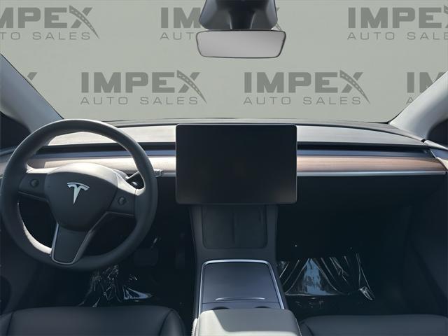 used 2025 Tesla Model Y car, priced at $40,450