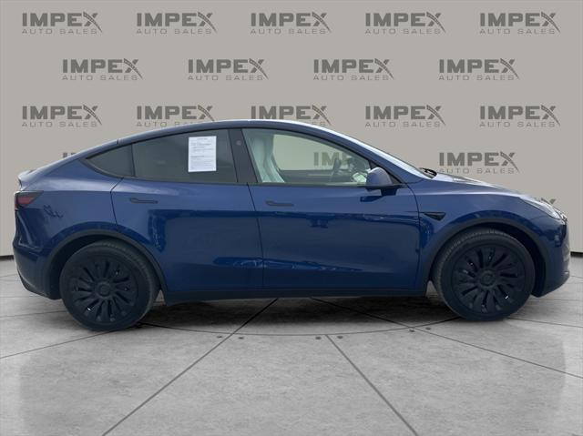 used 2023 Tesla Model Y car, priced at $33,600