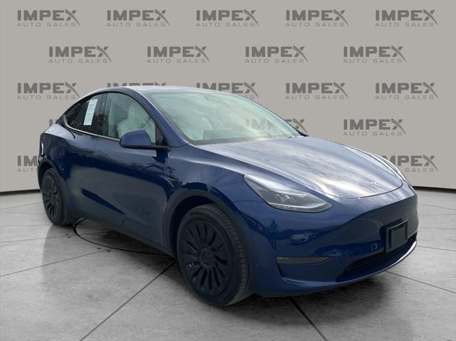 used 2023 Tesla Model Y car, priced at $33,600