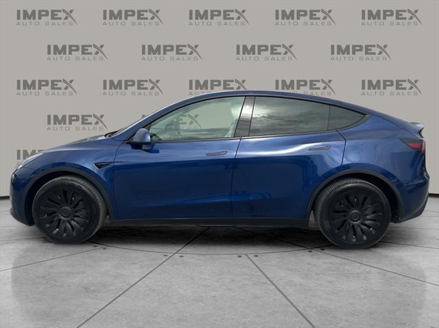 used 2023 Tesla Model Y car, priced at $33,600