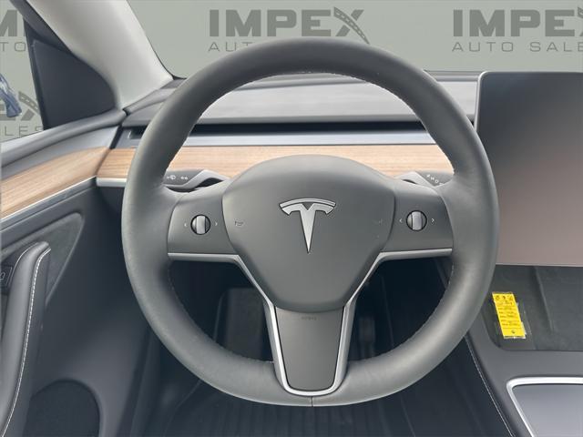 used 2023 Tesla Model Y car, priced at $33,600