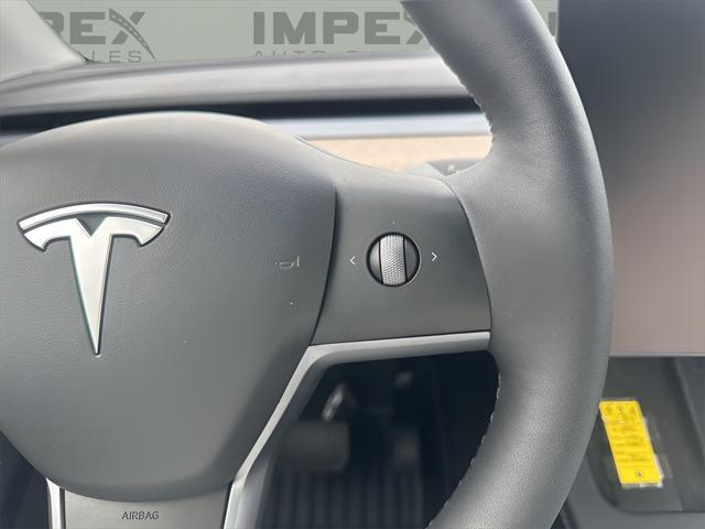 used 2023 Tesla Model Y car, priced at $33,600