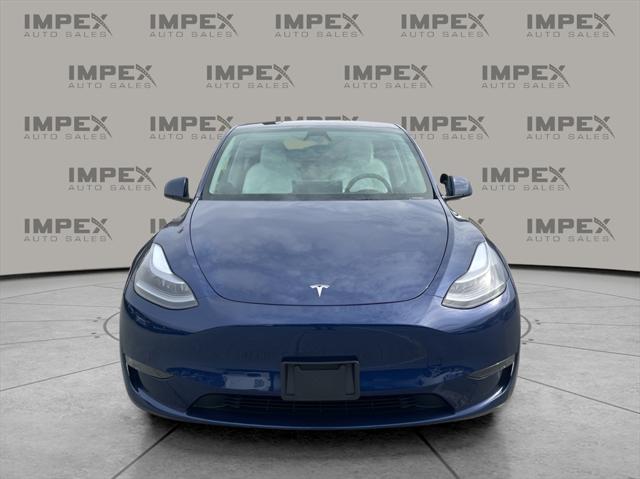 used 2023 Tesla Model Y car, priced at $33,600