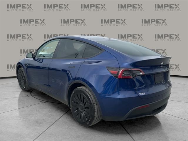 used 2023 Tesla Model Y car, priced at $33,600