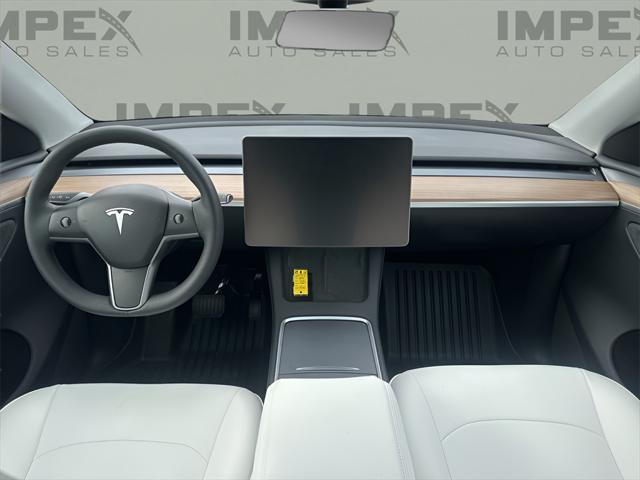 used 2023 Tesla Model Y car, priced at $33,600