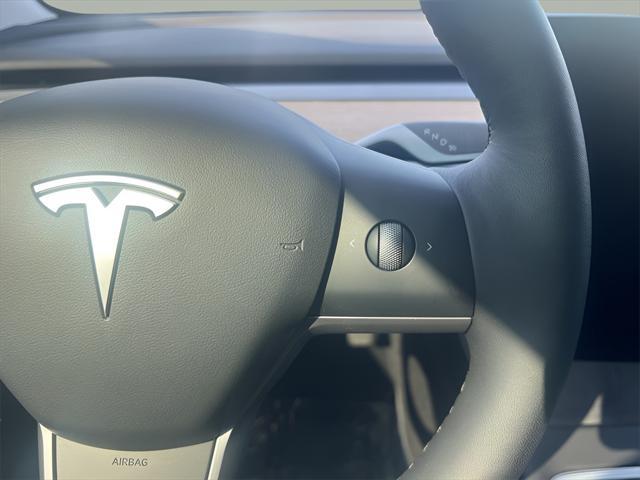 used 2022 Tesla Model 3 car, priced at $27,995