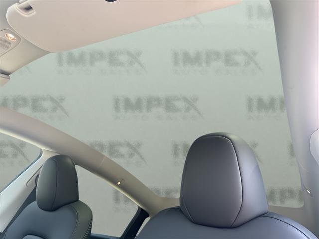 used 2024 Tesla Model Y car, priced at $34,200