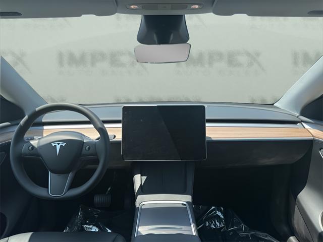 used 2024 Tesla Model Y car, priced at $34,200