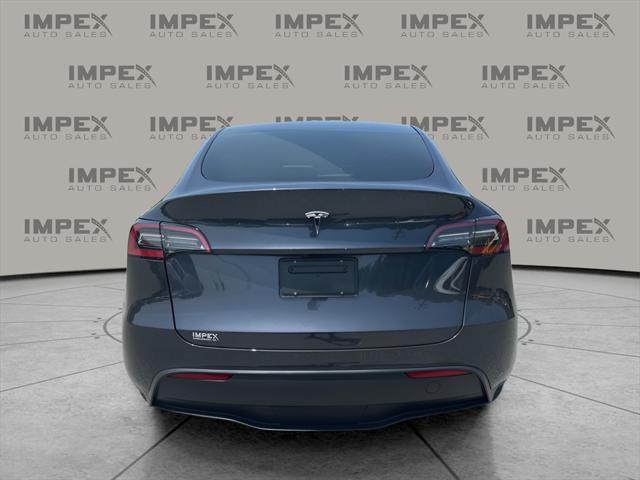 used 2024 Tesla Model Y car, priced at $34,200