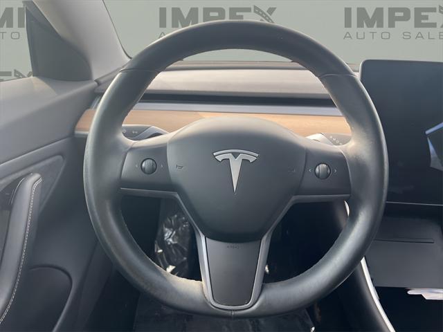 used 2018 Tesla Model 3 car, priced at $25,000