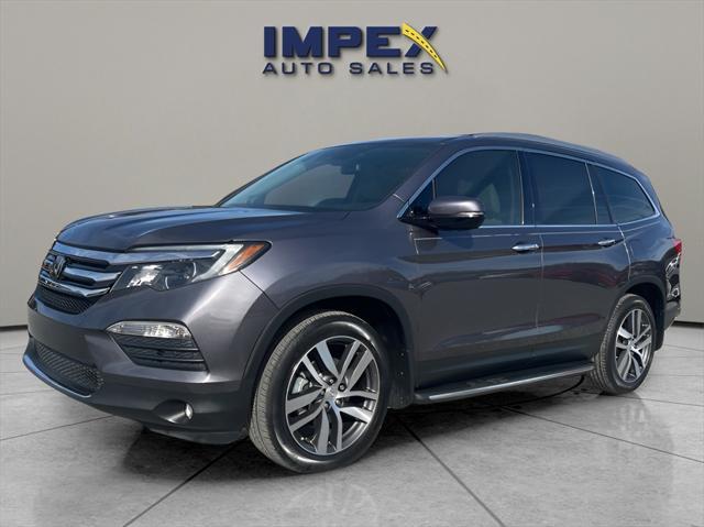 used 2018 Honda Pilot car, priced at $27,880