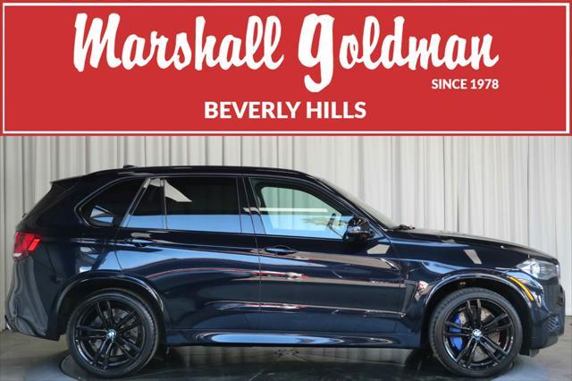 used 2018 BMW X5 M car, priced at $53,900