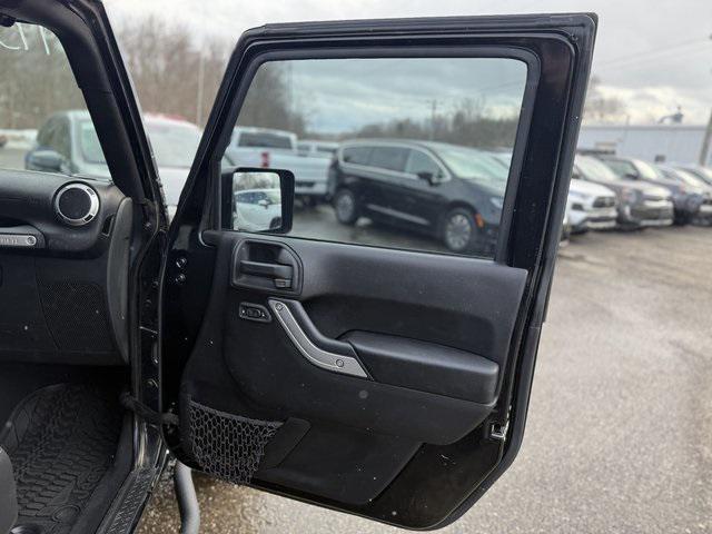 used 2015 Jeep Wrangler Unlimited car, priced at $17,298