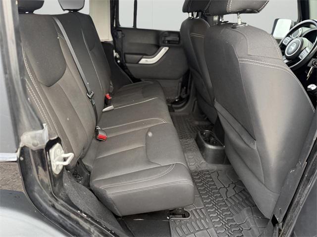 used 2015 Jeep Wrangler Unlimited car, priced at $17,576