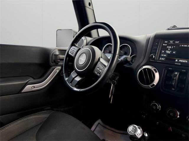 used 2015 Jeep Wrangler Unlimited car, priced at $17,576