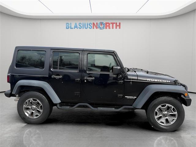 used 2015 Jeep Wrangler Unlimited car, priced at $17,576