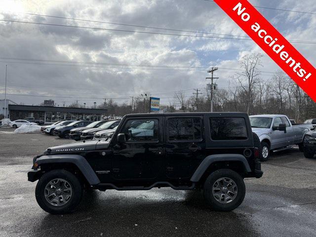 used 2015 Jeep Wrangler Unlimited car, priced at $18,746