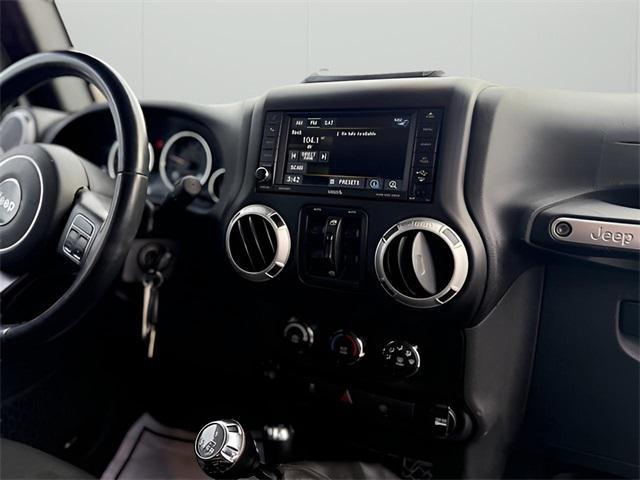 used 2015 Jeep Wrangler Unlimited car, priced at $17,576