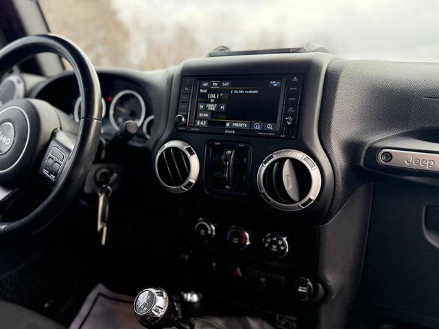 used 2015 Jeep Wrangler Unlimited car, priced at $17,298